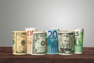 US Dollars and Euro Money on desk