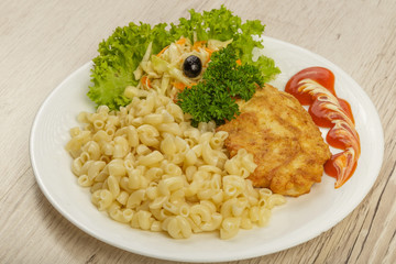 Pasta with a piece of grilled meat and salad.