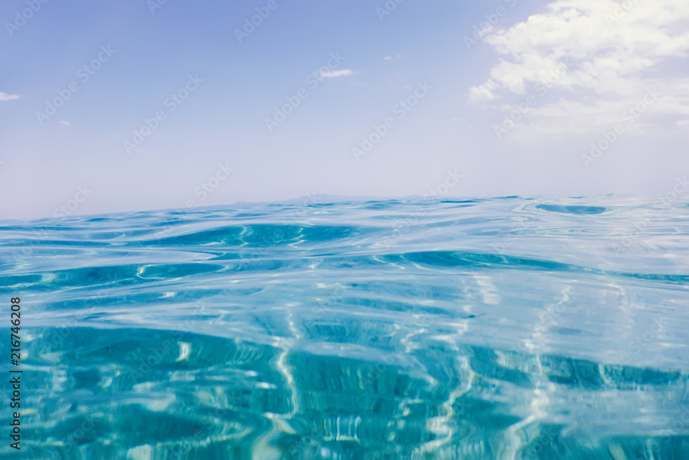 Wall mural Sea wave close up, low angle view water background