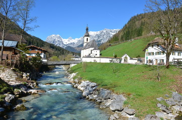 Fototapeta na wymiar Church by the river in Bavaria Germany