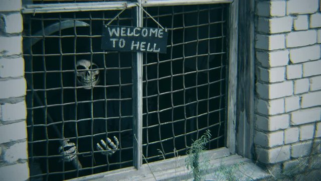 death with a scythe is behind the bars and waving his hand, calling with him