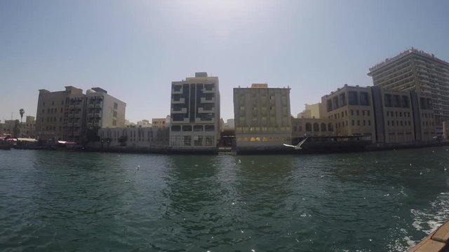Boat ride at the Dubai Creek from one to the other riverside
