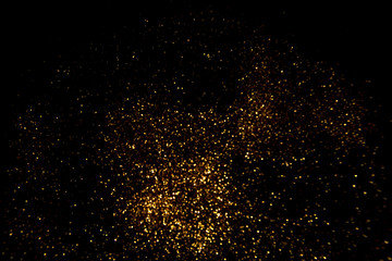 Abstract gold background. Glitter vintage lights background.