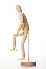 Wooden Dummy human upstair isolated white.