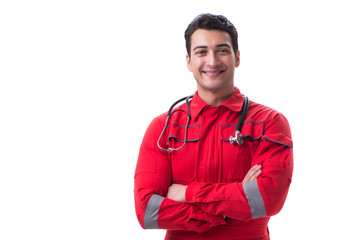 Young handsome man with stethoscope in red uniform isolated on w