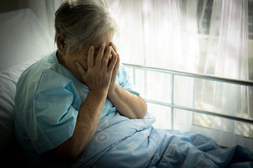 Lonely Elderly patients no relatives in hospital bed patients stressed want to go home - medical and healthcare concept