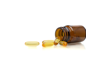 fish oil pills capsule in glass bottle
