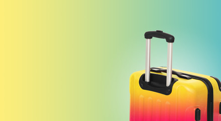 Fototapeta premium Colorful horizontal banner with suitcase and copyspace. Travelling concept.