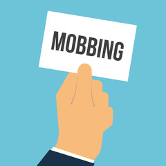 Man showing paper MOBBING text