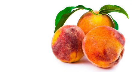 Peach with leaf isolated on white background with clipping path