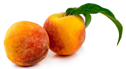 Peach with leaf isolated on white background with clipping path