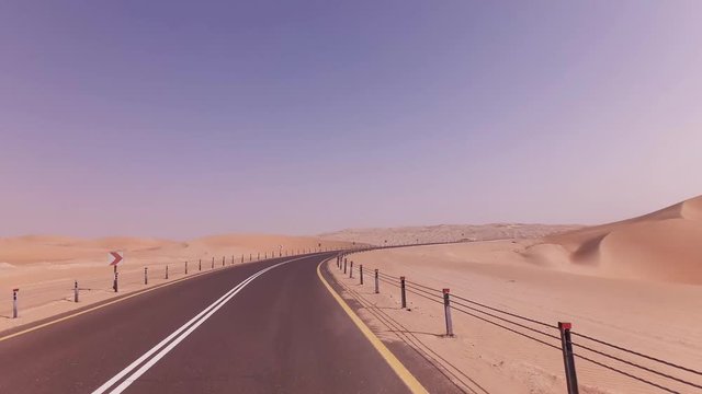 New road from Oasis Liwa to Moreeb Dune in Rub al Khali desert stock footage video
