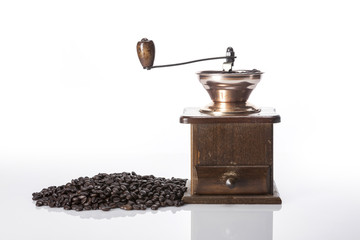 coffee glinder with a coffee cup isolated white.
