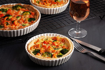 Home made french tart quiche with crayfish and broccoli filled with cream and eggs.