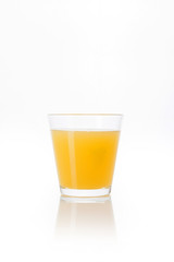 orange juice with a glass cup isolated white.