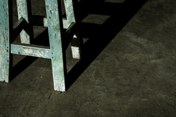 A chair under sun lights