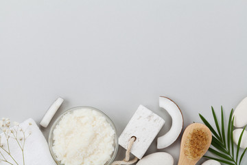 Homemade organic cosmetic for peeling and spa care. Body scrub of coconut oil, sugar and shavings top view. Flat lay.