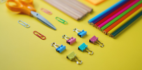 Tidy School Stationary on Yellow Background