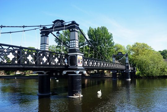 View of the Ferry Bridge also known as the Stapenhill Ferry Bridge and the River Trent, Burton upon Trent, UK.