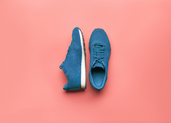One Pair of blue sport shoes on yellow background