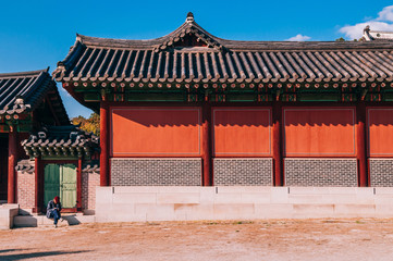Red wall of Changdeokgung Palace, Seoul, South Korea