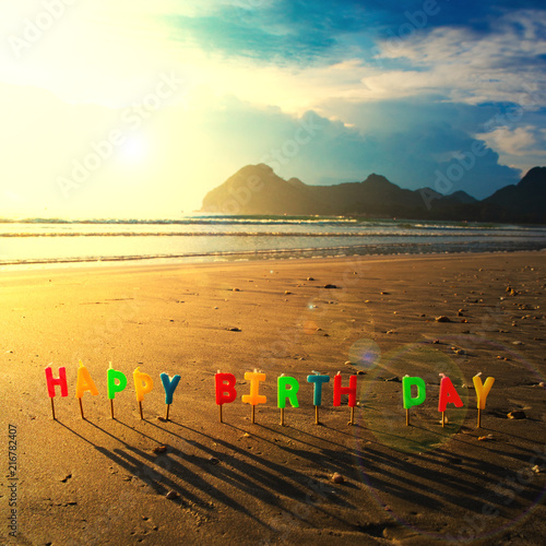 Happy Birthday Colorful Candles On A Beach Sunrise Stock