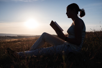 silhouette of a young beautiful woman