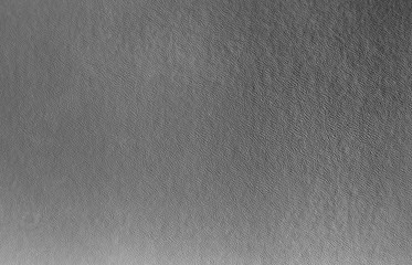 Gray leather texture background surface.