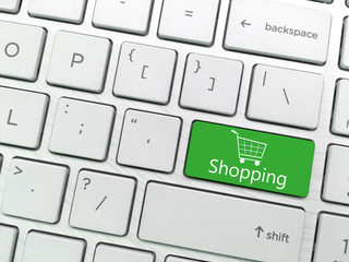 Computer keyboard enter button with Shopping and Shopping cart symbol
