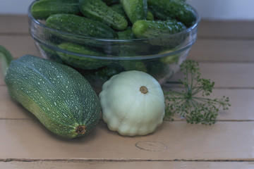 collected from the garden bed fresh vegetables on a wooden background