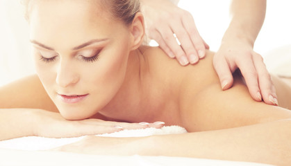 Healthy and Beautiful girl in Spa. Recreation, Energy, Health, Massage and Healing Concept.
