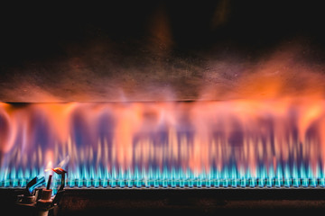 Burning flame inside of roaster