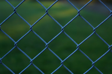 Fototapeta premium Close up view of chain link fence pattern