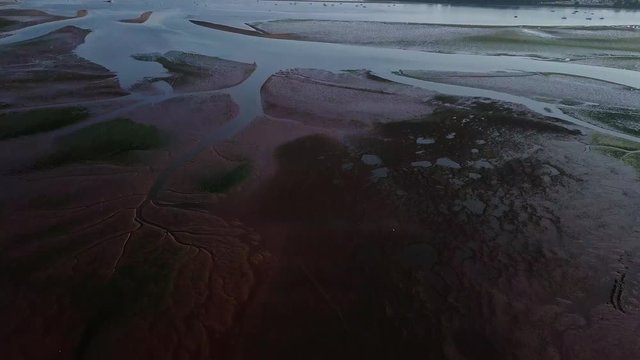 PANNING DOWN aerial view of the river in Lympstone in Devon