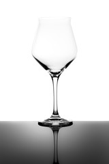 Empty New Teku Beer Glass and Reflection Isolated on White