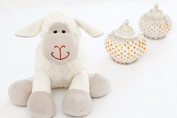 Greeting card on white background. Eid Al Adha sacrifice festival, Islamic Arabic candle and sheep.