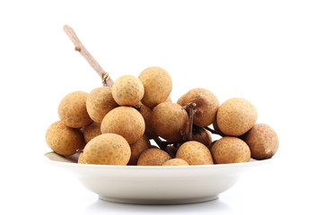 Fresh longan fruit placed on white background, isolated.