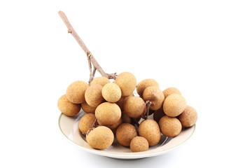 Fresh longan fruit placed on white background, isolated.