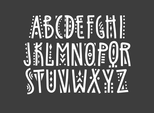 Vector uppercase ethnic alphabet, hand-drawn white letters decorated with geometric patterns on a black background.