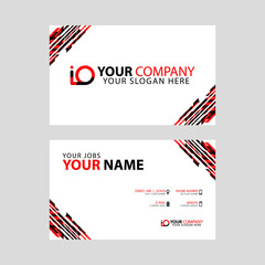 Horizontal name card with decorative accents on the edge and bonus IO logo in black and red.