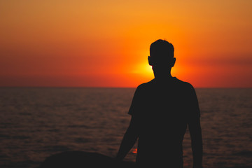 portrait silhouette of a men in the sunset