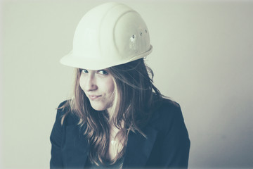 Young woman with hard hat