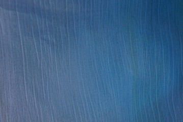 dark gray blue background of a piece of gray matter