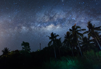 Milky Way galaxy rise above Kudat, Malaysia sky. Starry and clear night sky. soft focus and noise...
