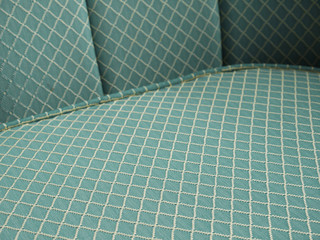green fabric sofa