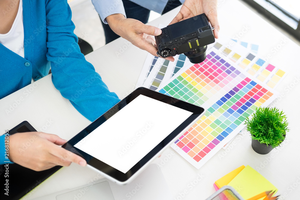 Poster creative or interior designers teamwork with swatch and building plans on office desk, architects ch