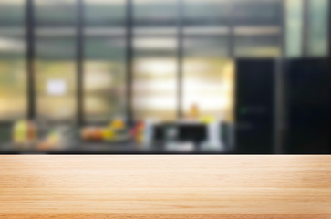 Wood table top on blur kitchen or cafe room background .For montage product display design key visual layout