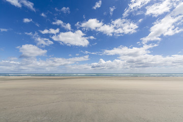 Golden sand beach in Farewell Spit Nature Reserve. Puponga, Tasman district, South Island, New Zealand.