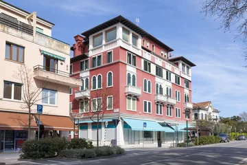 Foto auf Acrylglas Gran Viale Santa Maria Elisabeta, Lido island, Venice, Veneto, Italy with Liberty Style or Art Nouveau architecture. Main street scene   © gozzoli