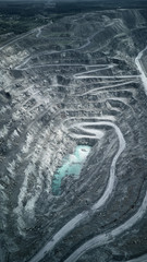 Aerial view of asbestos opencast mining quarry - view from above. Panorama of the quarry mining.